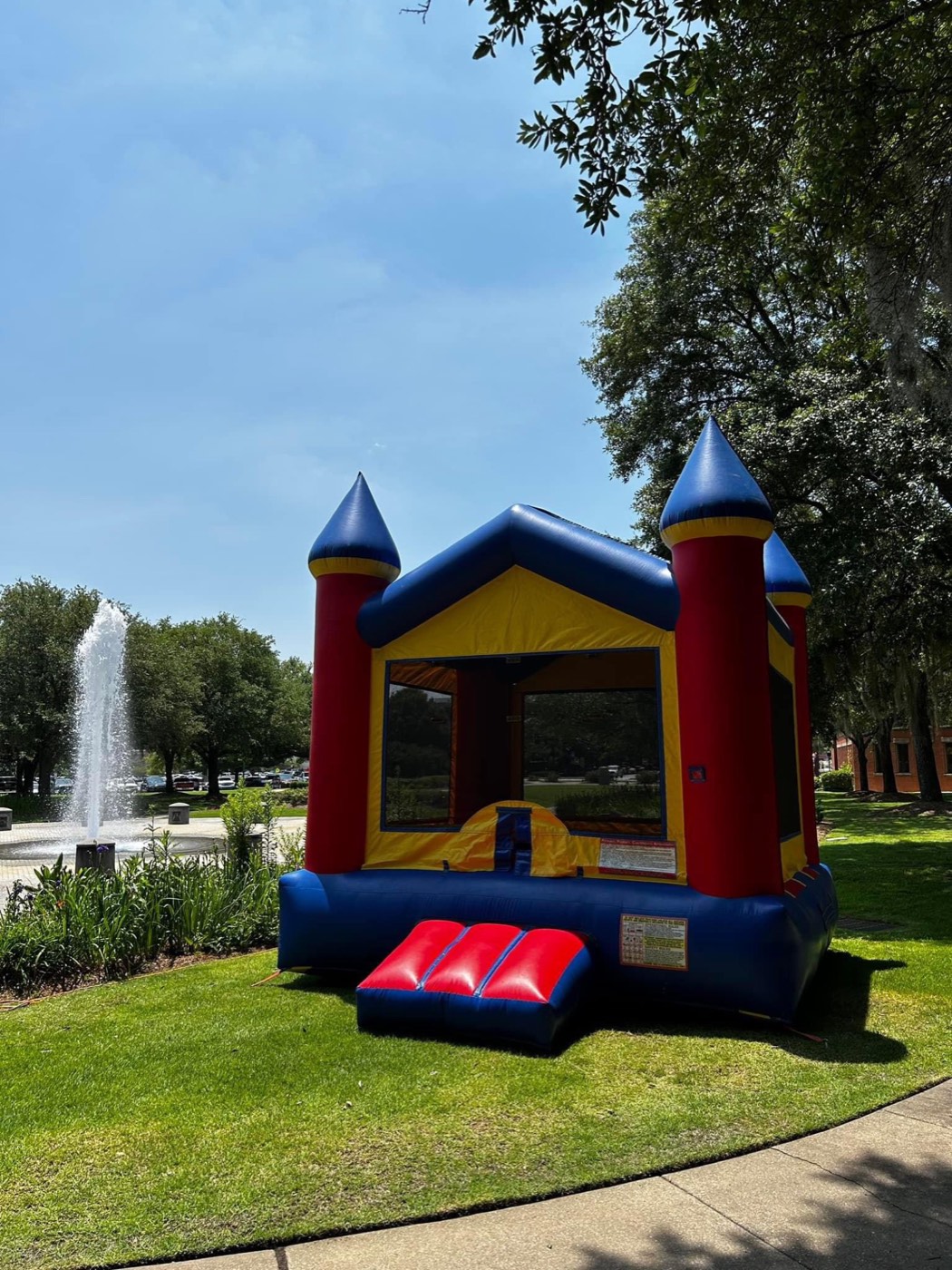 Classic red and blue bounce house castle rental