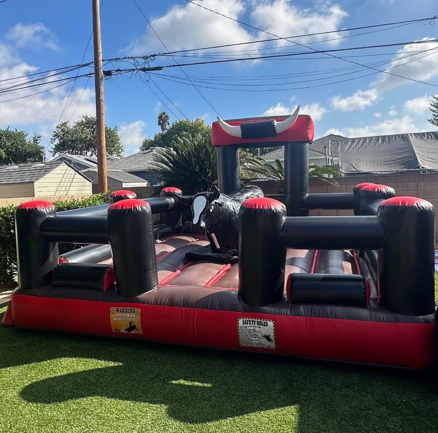 Black and red mechanical bull rental